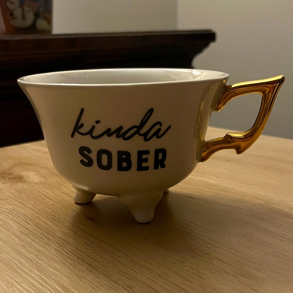 “Kinda Sober" Stoneware Footed Teacup with a gold electroplated handle.